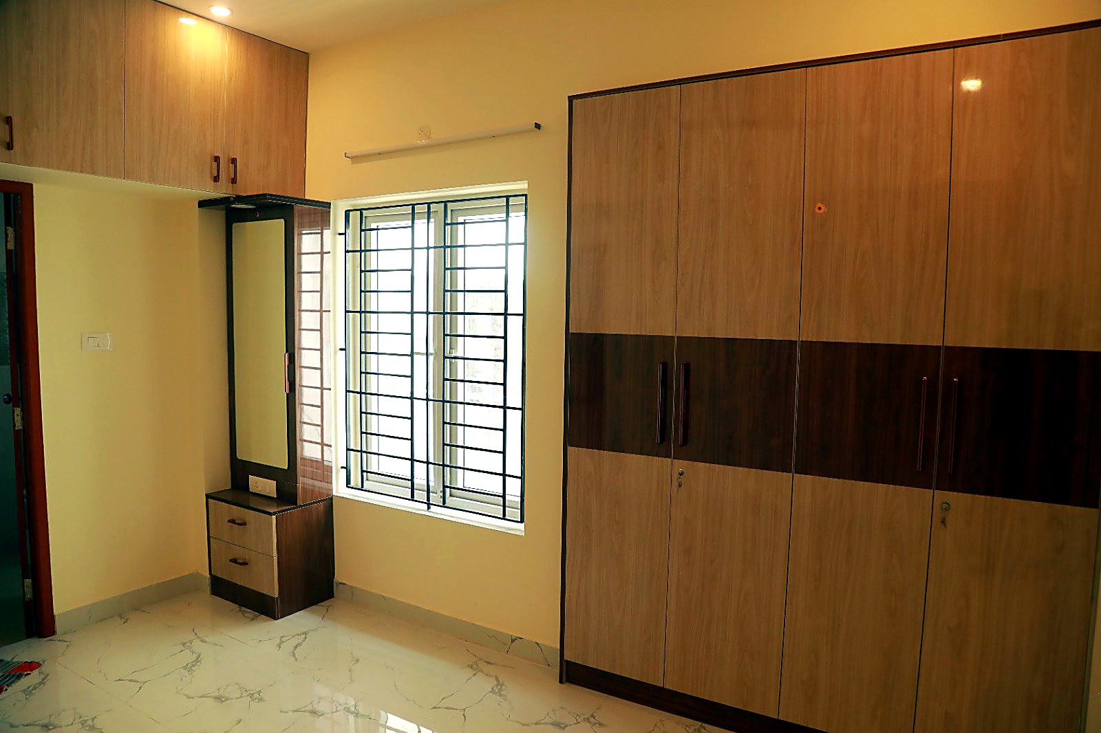 Bedroom with laminate wardrobe