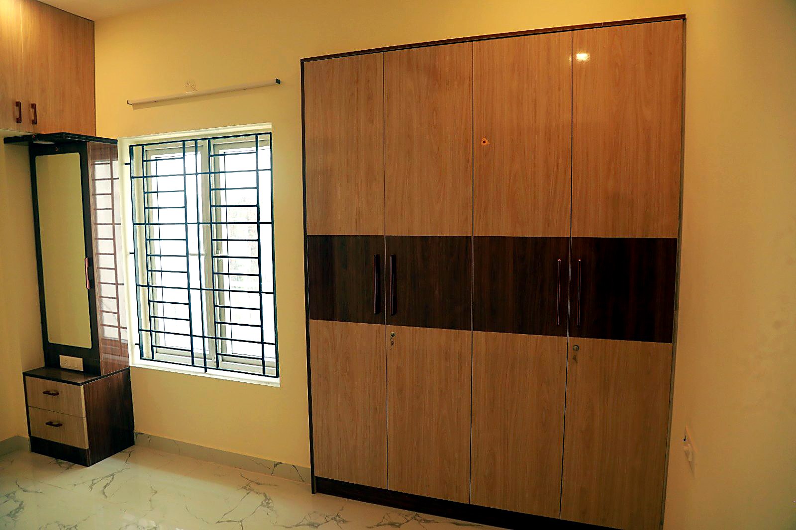 Master bedroom with full-height wardrobe